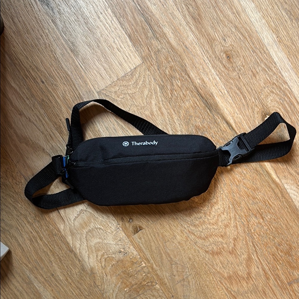 Therabody Black Belt Bag with Sleek Design and Adjustable Straps